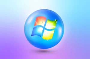 Windows logo displayed on a reflective, spherical design with vibrant colors and nature-inspired imagery.